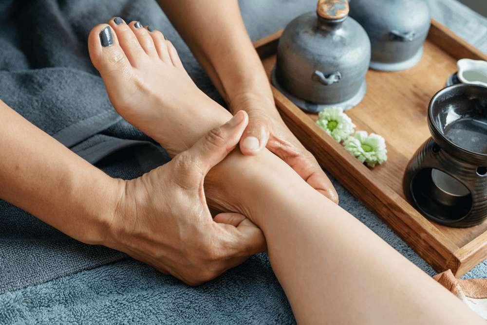 Refleksologinis pėdų masažas